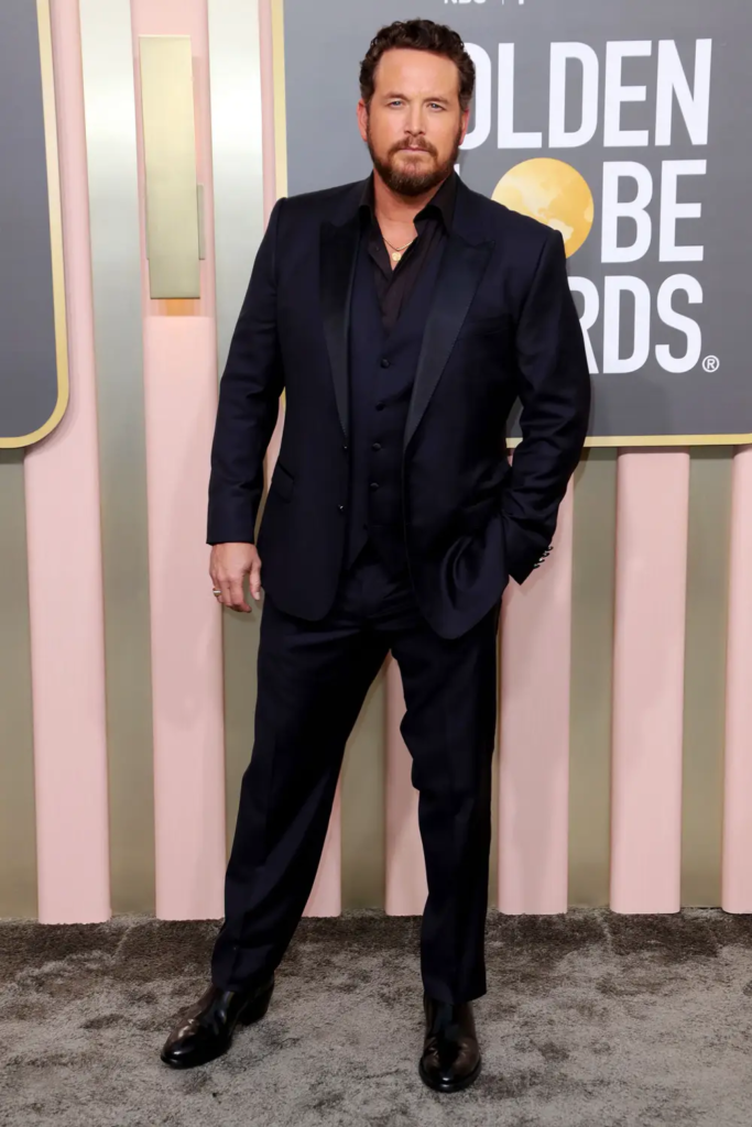 Cole Hauser wearing a custom black suit by Dior at the 80th Annual Golden Globe Awards