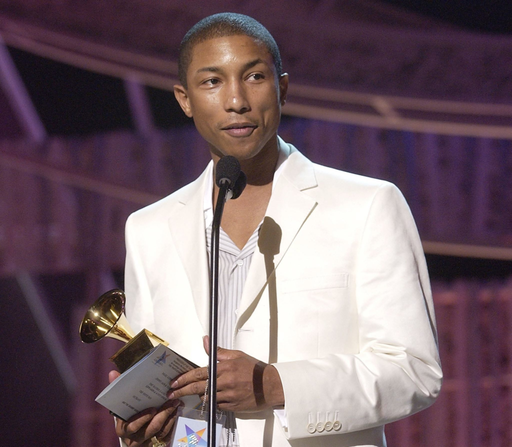 Pharrell Williams accepting his first Grammy Award for Producer of the Year (Non-Classical) at the 46th Annual Grammy Awards in 2004