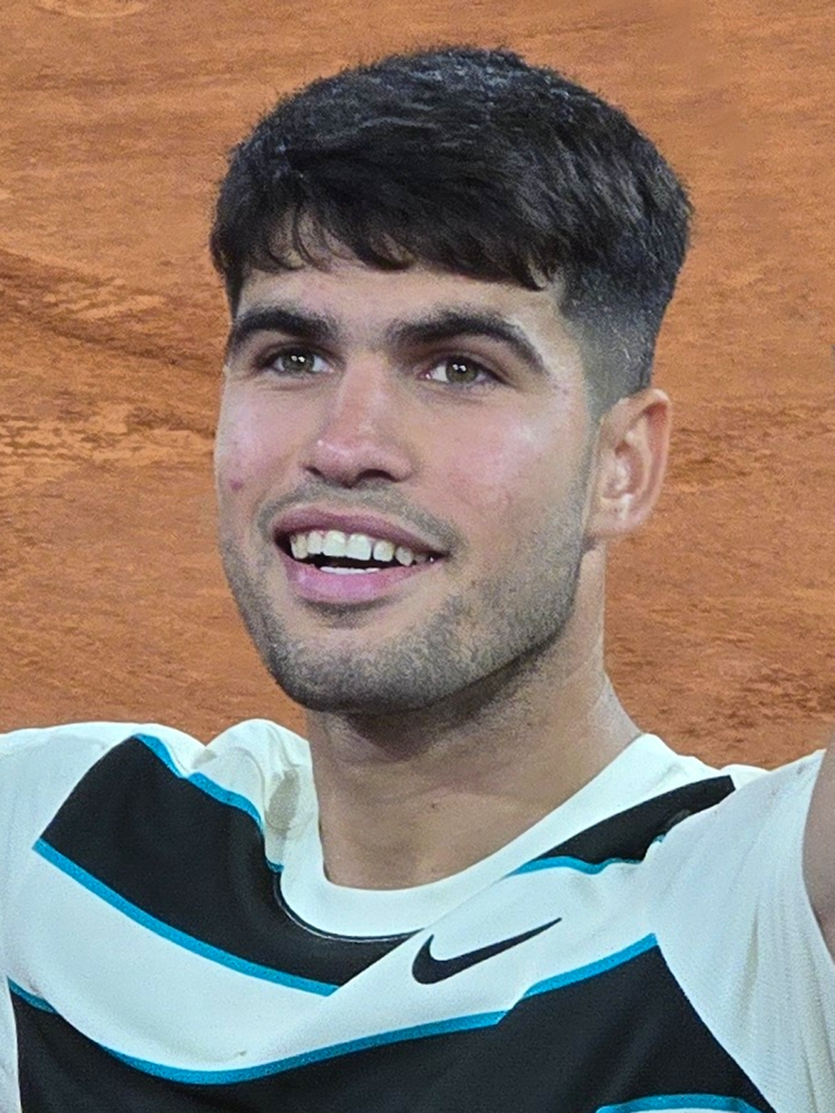 Carlos Alcaraz smiling