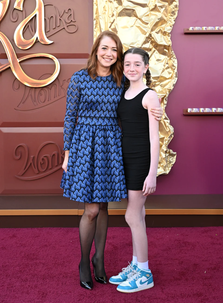 Alyson Hannigan and her daughter, Satyana Marie Denisof, at the "Wonka" premiere in Los Angeles