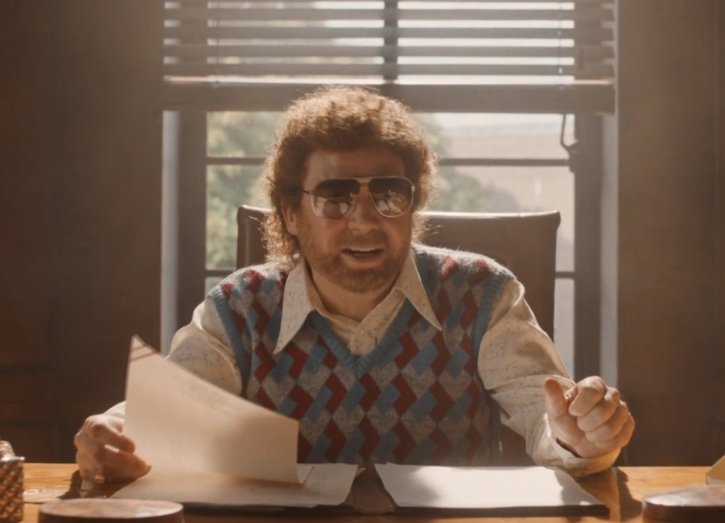 Mike Myers in the role of Ray Foster from the 2018 film Bohemian Rhapsody