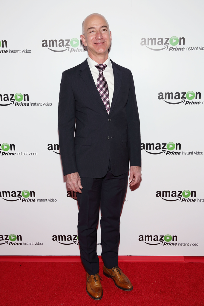 Jeff Bezos at an event with an Amazon Prime branded backdrop