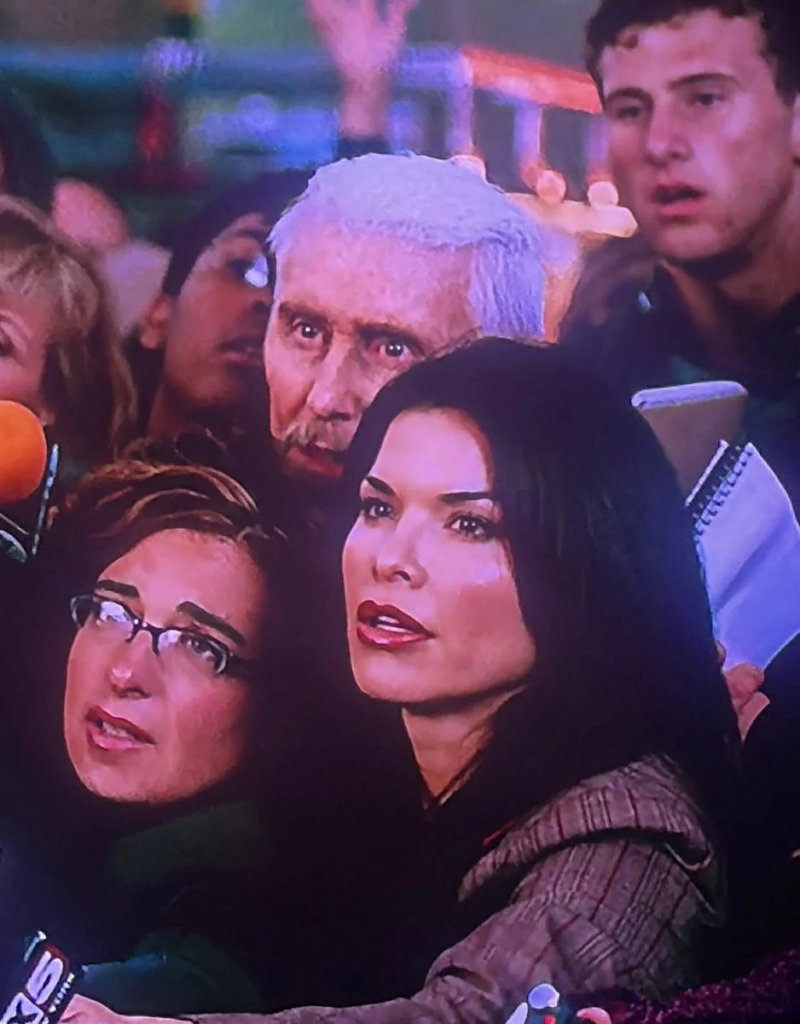 Lauren Sanchez playing a news reporter in a scene from the 2005 film Fantastic Four