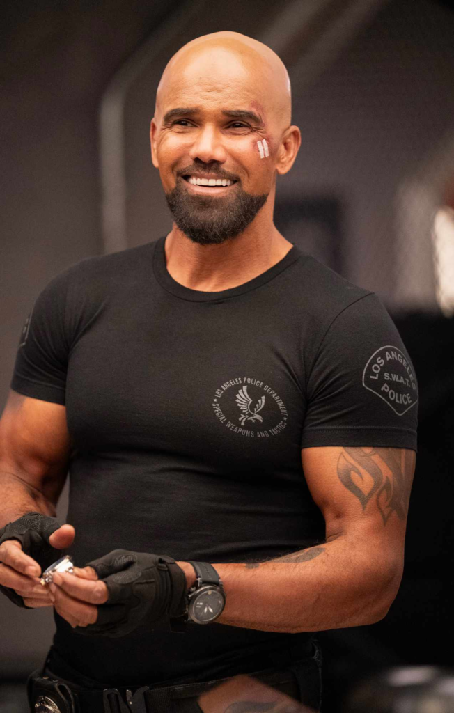 Shemar Moore as Hondo in the television show S.W.A.T., wearing a black Tactical Operator shirt with a LAPD badge