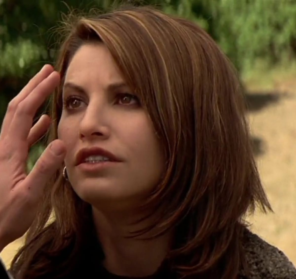 Gina Gershon as Sasha Hassler in the 1997 action film Face/Off