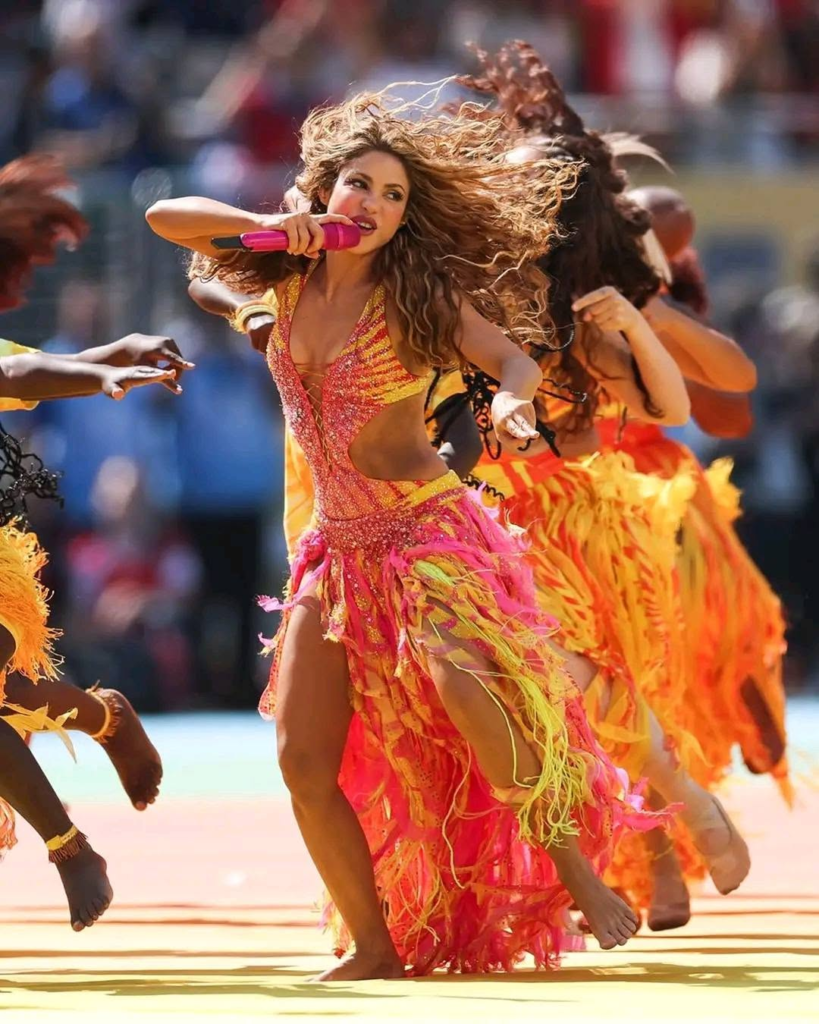 Shakira performing in a custom Roberto Cavalli dress designed by Fausto Puglisi at the 2026 FIFA World Cup Final