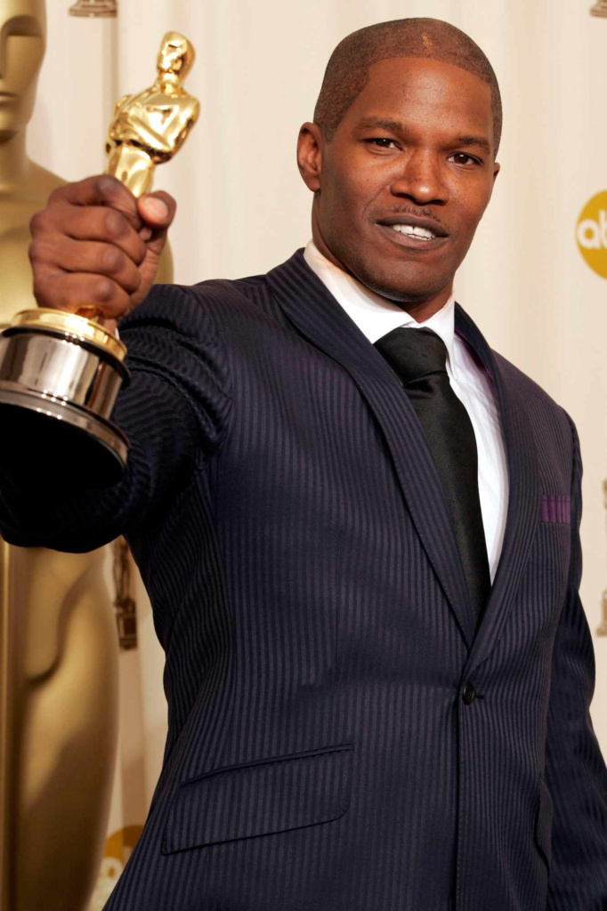 Jamie Foxx celebrating his Best Actor win for the film Ray at the 77th Academy Awards