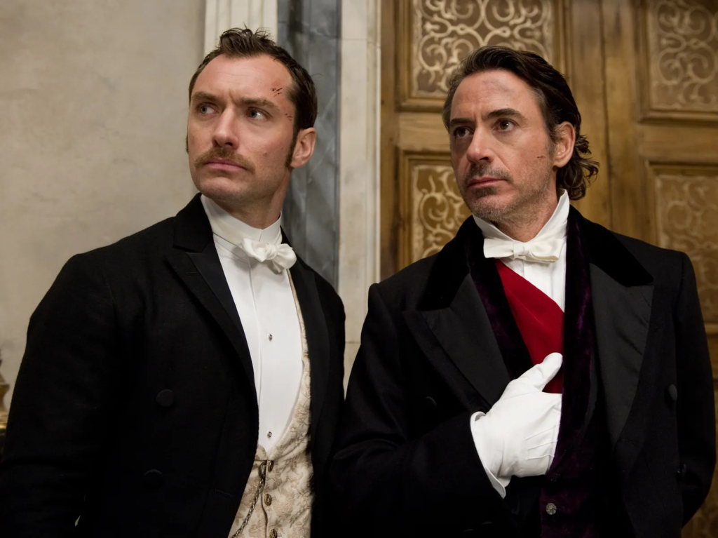 Jude Law as Dr. John Watson and Robert Downey Jr. as Sherlock Holmes in the 2011 action-mystery sequel Sherlock Holmes: A Game of Shadows