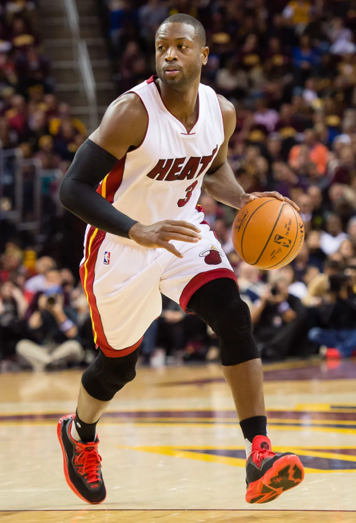 Dwyane Wade playing for the Miami Heat, wearing his signature number 3 white jersey