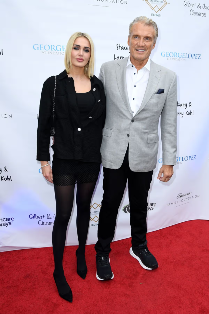 Dolph Lundgren and his wife, Emma Krokdal, at a celebrity event