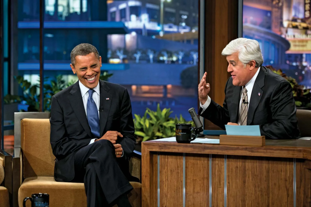 U.S. President Barack Obama laughing during an appearance on The Tonight Show with Jay Leno at NBC Studios in Burbank, California