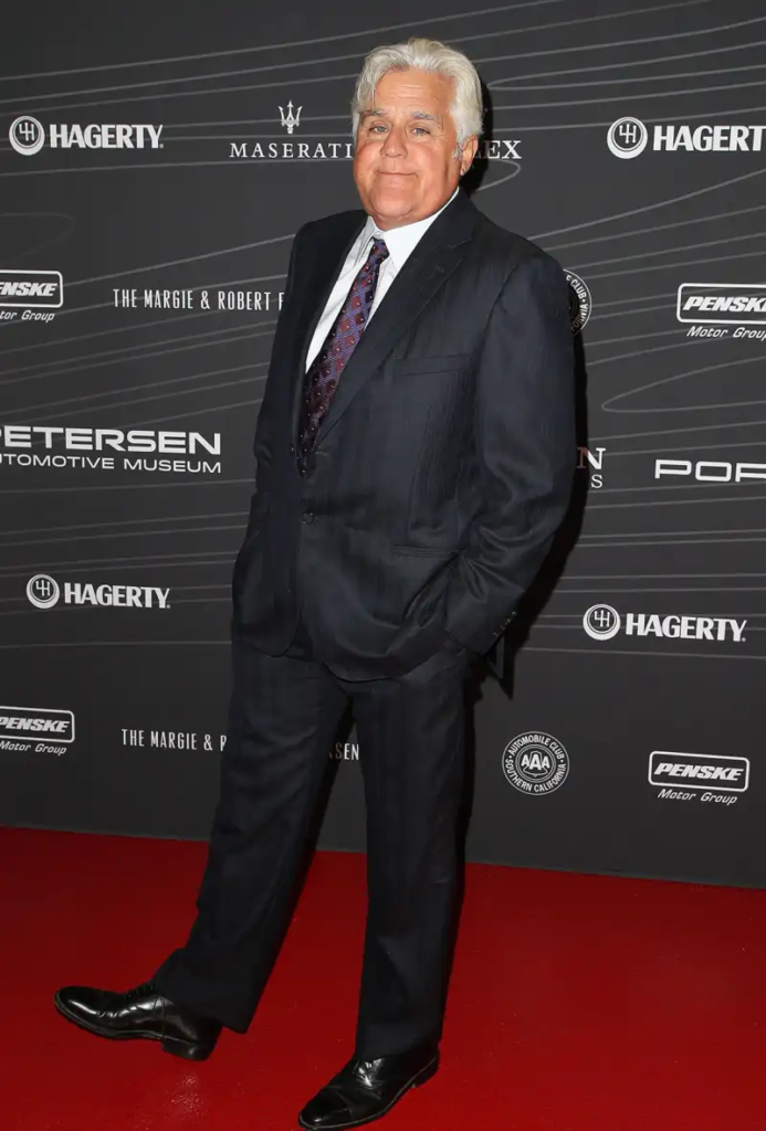 renowned comedian and former late-night television host Jay Leno attending an automotive industry event