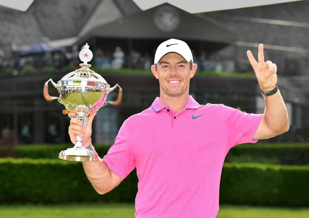 Professional golfer Rory McIlroy celebrates with the RBC Canadian Open trophy after successfully defending his title with a final-round 62 in Toronto on June 12, 2022