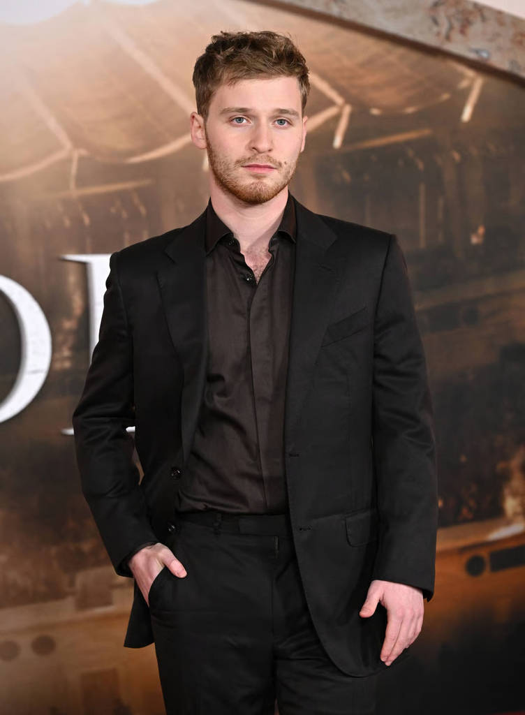actor Fred Hechinger attending a red-carpet event