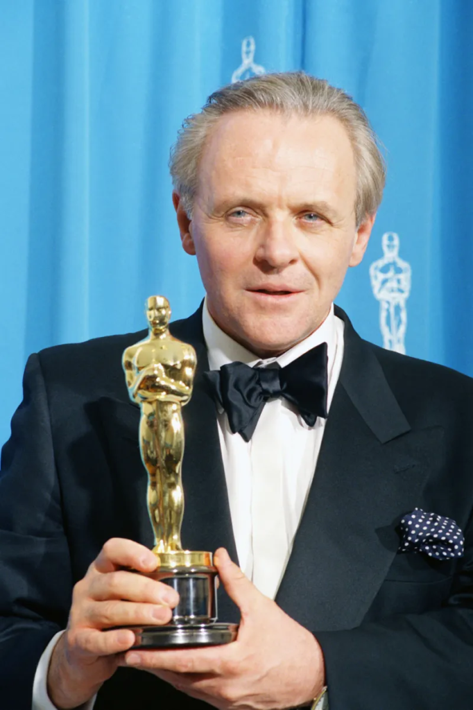 Anthony Hopkins holding his Best Actor Oscar for The Silence of the Lambs at the 64th Academy Awards