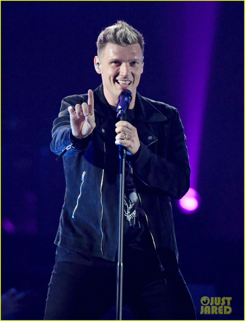 Nick Carter performing on stage with the Backstreet Boys during their 2022 DNA World Tour