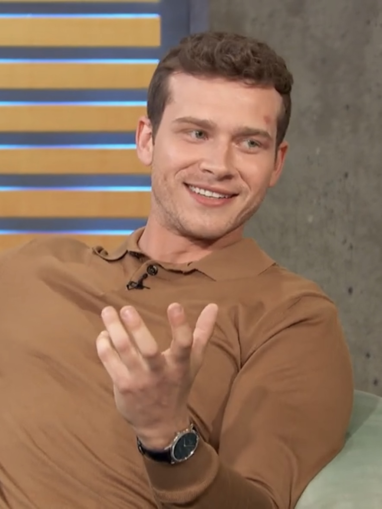 Oliver Stark smiling