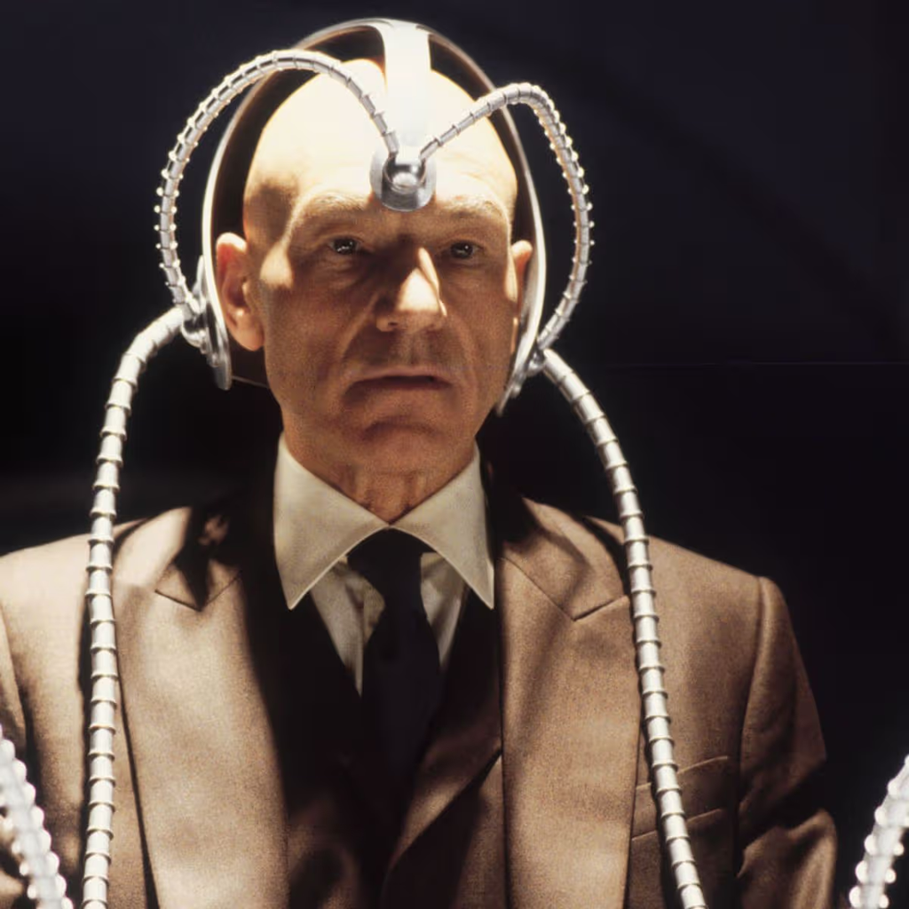 Sir Patrick Stewart portraying the character Charles Xavier wearing a Cerebro interface headset from the X-Men film franchise