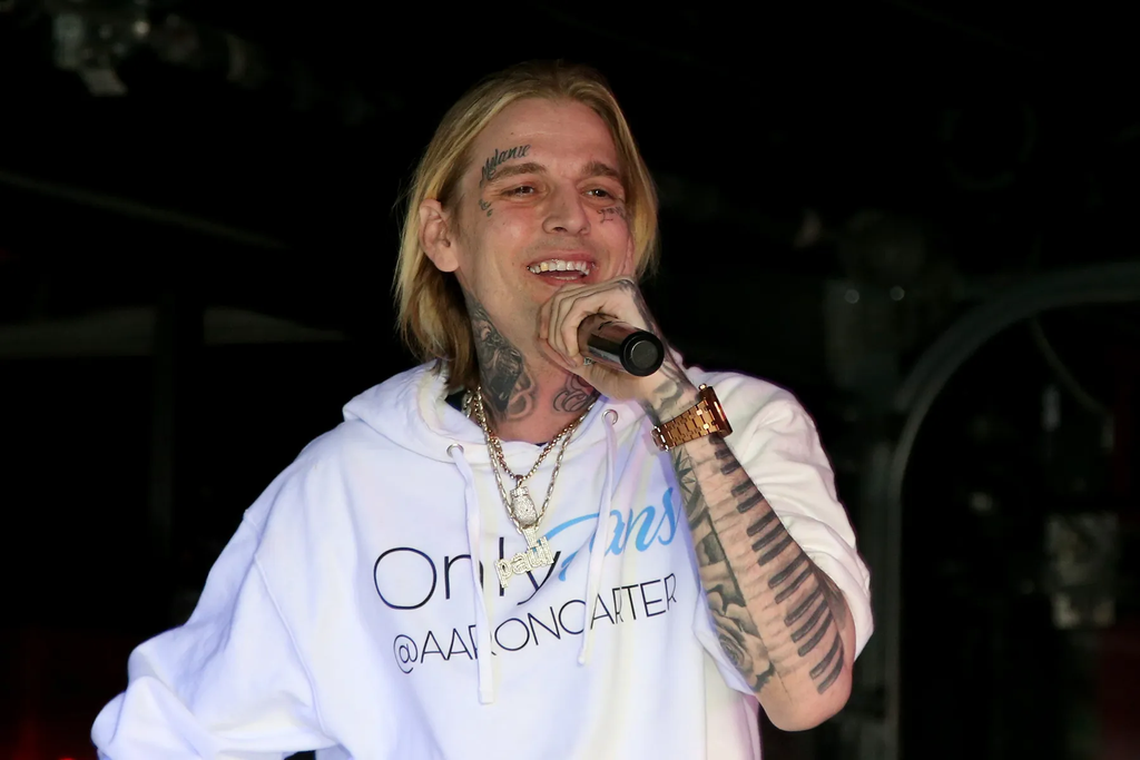 late American singer and rapper Aaron Carter performing on stage