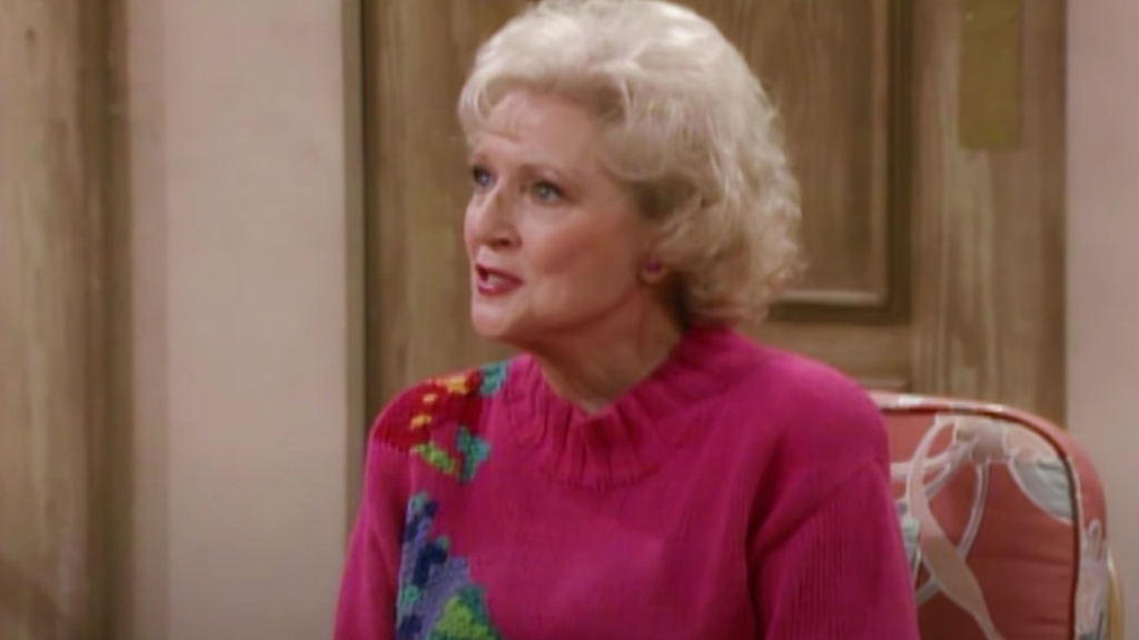 Betty White playing the beloved character Rose Nylund on the classic television sitcom The Golden Girls