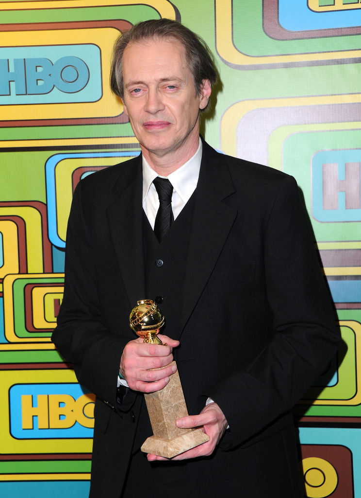 Actor Steve Buscemi holds his Golden Globe award in the press room at the 68th Golden Globe Awards on January 16, 2011