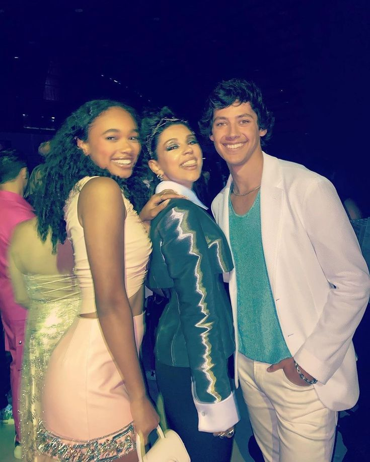 actors Chandler Kinney, Meg Donnelly (center), and Matt Cornett together at an event