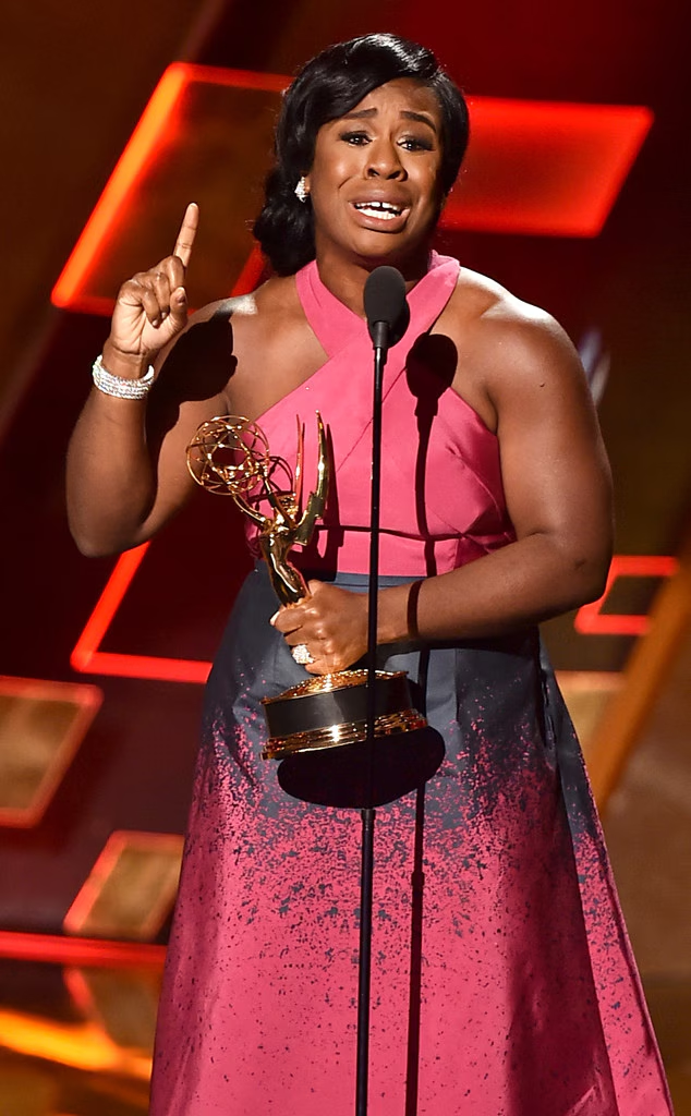 actress Uzo Aduba accepting an Emmy Award at the 67th Primetime Emmy Awards in 2015