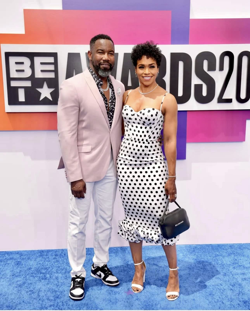 Actor Michael Jai White and his wife, actress Gillian Iliana White (Gillian Iliana Waters), are pictured walking the red carpet at the 2024 BET Awards at the Peacock Theater in Los Angeles on June 30, 2024