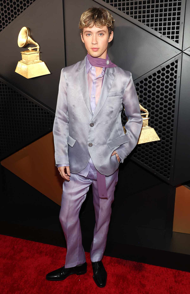 Troye Sivan attends the 67th Annual Grammy Awards in a custom lavender and lilac sheer silk organza Prada suit