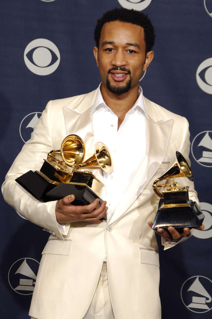 John Legend poses with his three Grammy Awards—Best New Artist, Best R&B Album (Get Lifted), and Best Male R&B Vocal Performance ("Ordinary People")—in the press room at the 48th Annual Grammy Awards on February 8, 2006