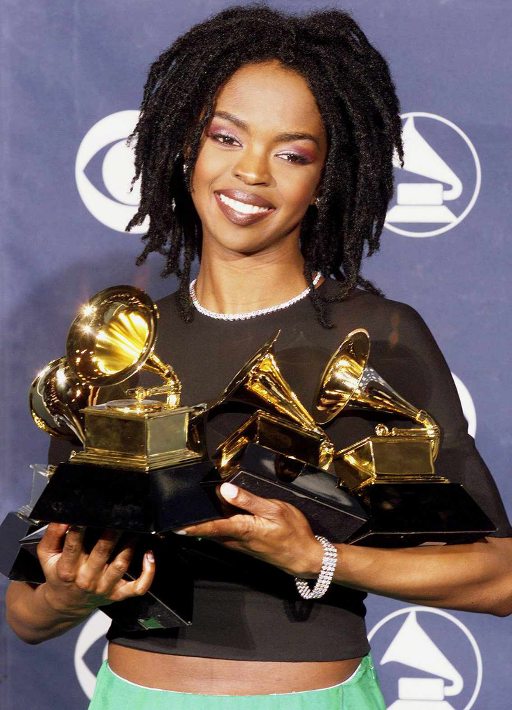 Lauryn Hill holding her five Grammy Awards in the press room at the 41st Annual Grammy Awards on February 24, 1999