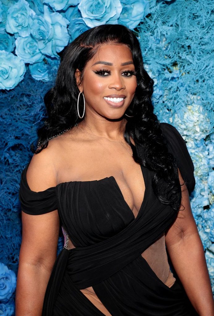 Remy Ma smiling